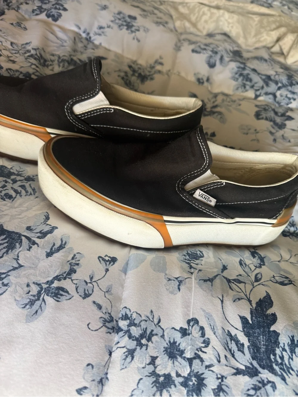 Vans Black and Tan Platform Slip-On Sneakers
